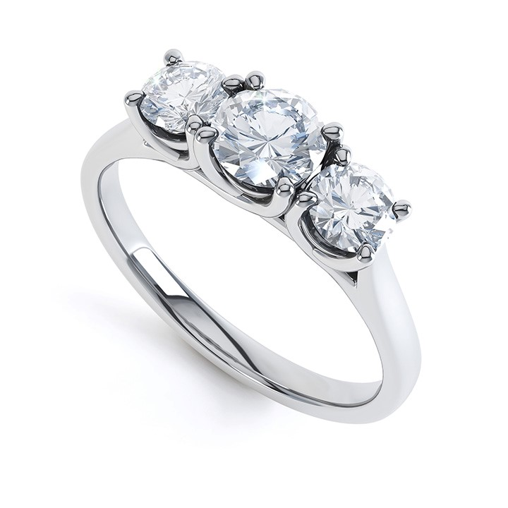 Three stone cross wire claw set ring in platinum